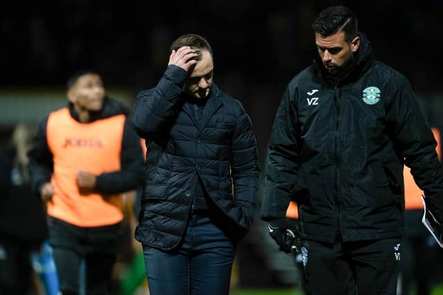 Hibs manager Shaun Maloney (centre) speaks to his assistant Valerio Zuddas after the match at Motherwell.