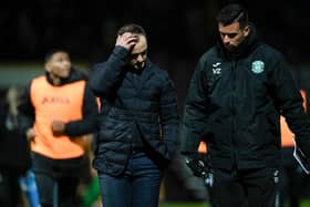 Hibs manager Shaun Maloney (centre) speaks to his assistant Valerio Zuddas after the match at Motherwell.