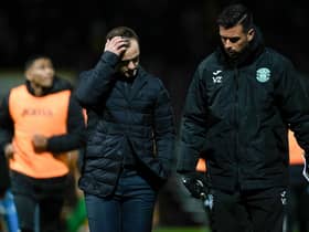 Hibs manager Shaun Maloney (centre) speaks to his assistant Valerio Zuddas after the match at Motherwell.