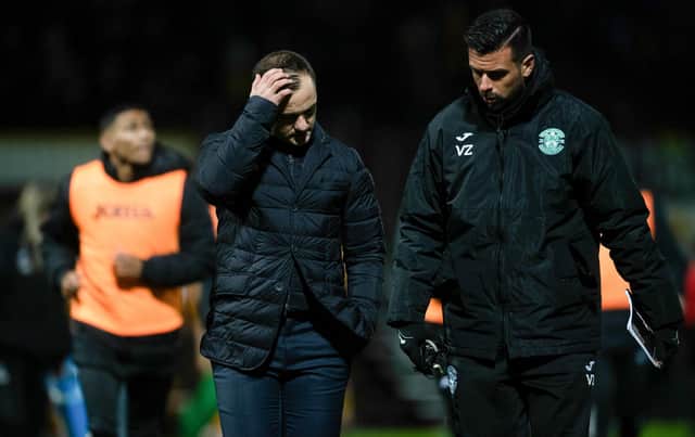 Hibs manager Shaun Maloney (centre) speaks to his assistant Valerio Zuddas after the match at Motherwell.