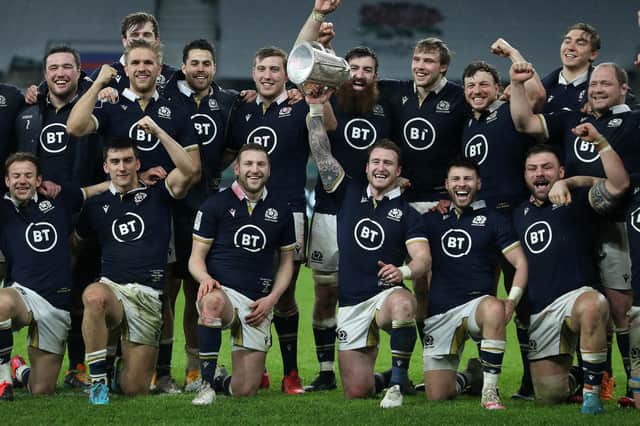 Scotland players celebrate after winning the Calcutta Cup at Twickenham in the 2021 Six Nations. (Photo by David Rogers/Getty Images)