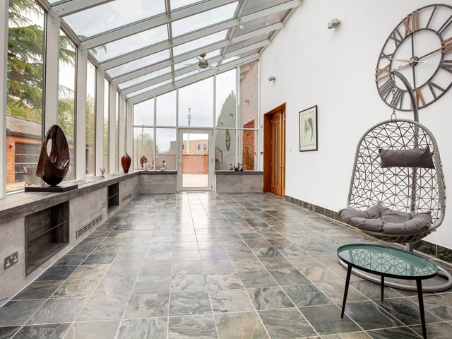 The light and airy conservatory has ample space.