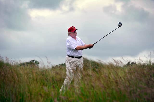 Donald Trump plays a round of golf at his Aberdeenshire resort. (Picture: Andy Buchanan/AFP/Getty)