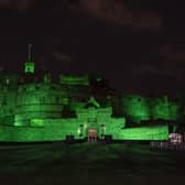 Edinburgh Castle lit up green for NSPCC.
