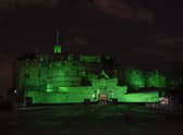 Edinburgh Castle lit up green for NSPCC.