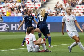 Scotland’s Claire Emslie turns away to celebrate her goal with Lisa Evans against England in the World Cup. Cr: SNS Group Alan Harvey