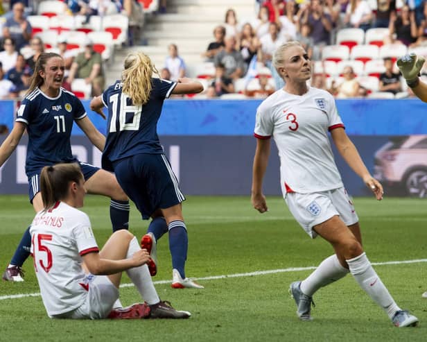 Scotland’s Claire Emslie turns away to celebrate her goal with Lisa Evans against England in the World Cup. Cr: SNS Group Alan Harvey
