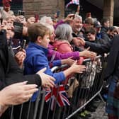 King Charles III greets members of the public after an official council meeting at the City Chambers in Dunfermline, Fife, to formally mark the conferral of city status on the former town