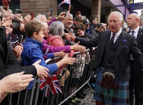 King Charles III greets members of the public after an official council meeting at the City Chambers in Dunfermline, Fife, to formally mark the conferral of city status on the former town