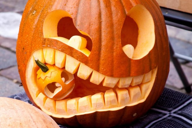 This design can be as complicated as you want it to be. To make it look as visually impressive as the one above will require some patience and skill with your carving - but even a basic pumpkin face with a miniature gourd popped on the mouth will make your pumpkin stand out this Halloween.