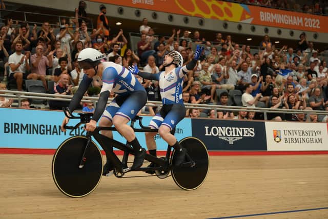 Neil Fachie (rear) celebrates as he and pilot Lewis Stewart win gold at the London Velodrome. Alex Broadway/SWpix.com