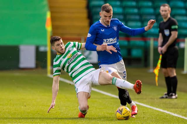 Celtic's Ryan Christie (left) tackles Rangers' Borna Barisic during the recent Scottish Premiership match between Celtic and Rangers at Celtic Park