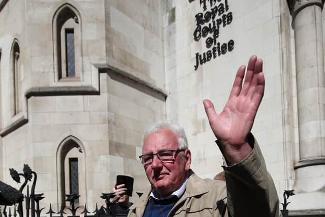 Former post office worker Noel Thomas, who was convicted of false accounting in 2006, waves as his leaves the Royal Courts of Justice, London, after having his conviction overturned by the Court of Appeal (Photo: Yui Mok/PA Wire).