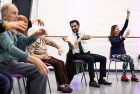 Humza Yousaf takes part in a dance performance during a visit to the Edinburgh Community Performing Arts re-connect project on Monday (Picture: Jeff J Mitchell/PA)