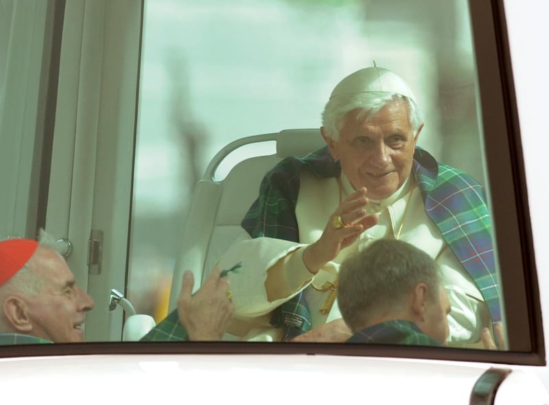 Pope Benedict XVI greeted the crowds in Edinburgh.