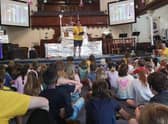 Matt Sinar, Fetteresso Church’s youth and children’s worker, talks with some of the children and leaders at one of the holiday club group sessions.