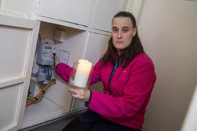 Nicola Elson, 32, says she has to fork out up to £760 a month for electricity at her two-bed flat in Hamilton, South Lanarkshire, Scotland. Picture: Katielee Arrowsmith/SWNS