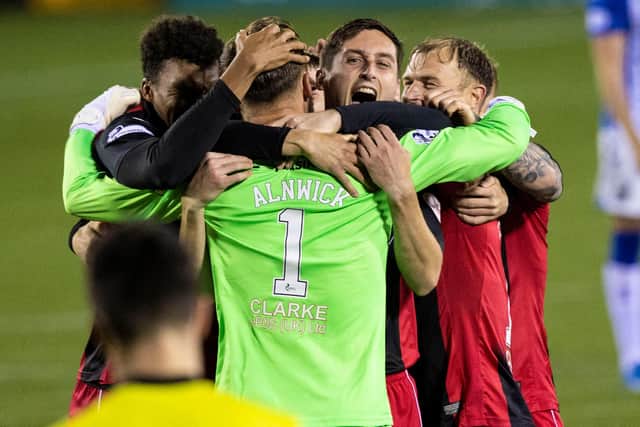 St Mirren players celebrate after their penalty shootout win over Kilmarnock in the clubs' epic Scottish Cup quarter-final. (Photo by Craig Williamson / SNS Group)