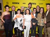 AUSTIN, TEXAS - MARCH 11: (L-R) Jenny Slate, Daniel Kwan, Tallie Mendel, Jamie Lee Curtis, Daniel Scheinert, Stephanie Hsu, Ke Huy Quan, Jonathan Wang, Michelle Yeoh and Harry Shum Jr. attend the opening night premiere of "Everything Everywhere All At Once" during the 2022 SXSW Conference and Festivals at The Paramount Theatre on March 11, 2022 in Austin, Texas. (Photo by Rich Fury/Getty Images for SXSW)