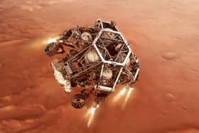 NASA's Perseverance rover firing up its descent stage engines as it nears the Martian surface. Technology made by Scottish academics will be involved in the next mission to Mars. Picture: PA