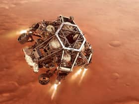 NASA's Perseverance rover firing up its descent stage engines as it nears the Martian surface. Technology made by Scottish academics will be involved in the next mission to Mars. Picture: PA