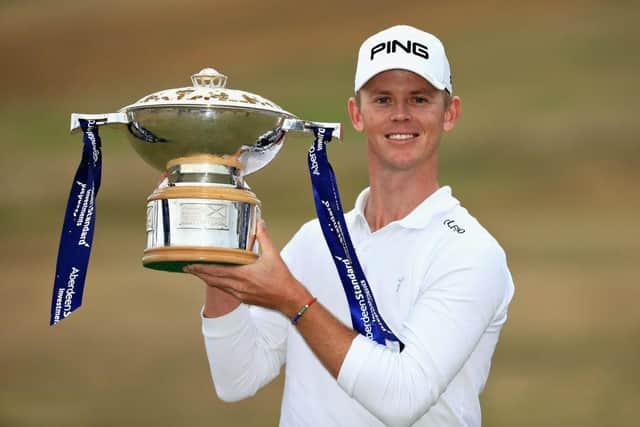 Brandon Stone shows off the trophy after his win in the 2018 Aberdeen Standard Investments Scottish Open at Gullane. Picture: Andrew Redington/Getty Images.