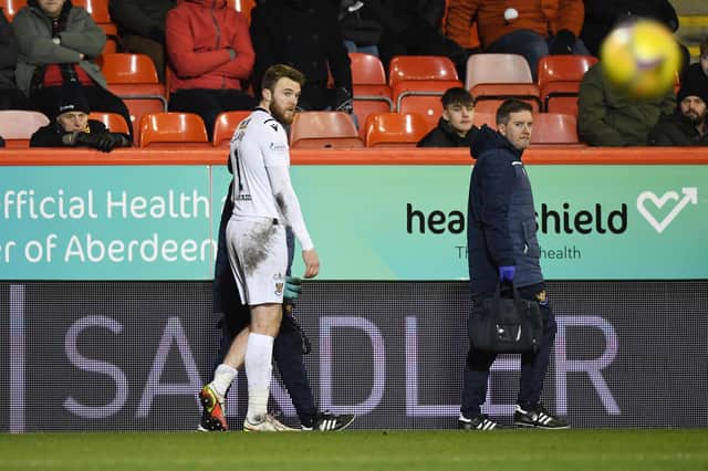 St Johnstone's Zander Clark went off injured against Aberdeen.  (Photo by Ross MacDonald / SNS Group)