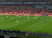 England and Scotland players take a knee in support of racial equality before their match at Euro 2020. Picture: Getty