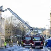 Emergency services at the scene at the New County Hotel in Perth where three people died following a fire (Picture: Robert Perry/PA Wire)