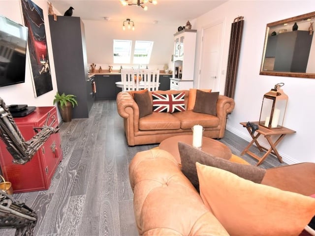 Open plan living room, kitchen and dining area.