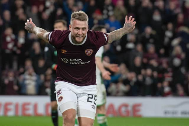 Stephen Humphrys celebrates after scoring for Hearts in the 3-0 derby win over Hibs on January 2. (Photo by Mark Scates / SNS Group)
