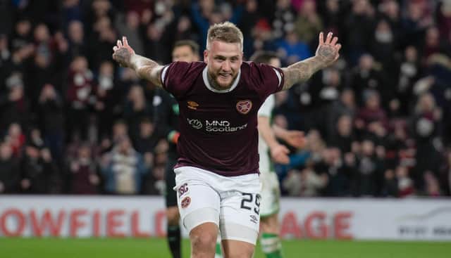 Stephen Humphrys celebrates after scoring for Hearts in the 3-0 derby win over Hibs on January 2. (Photo by Mark Scates / SNS Group)