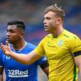 Rangers' Alfredo Morelos (left) with Ryan Porteous before the Hibs man was sent off in Sunday's league match. Photo by Rob Casey / SNS Group