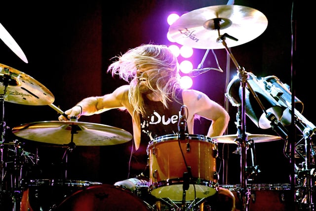 Taylor Hawkins of Foo Fighters performs on stage (Photo by Kevin Winter/Getty Images for iHeartMedia)