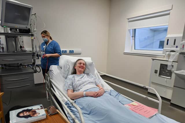 Cat Thomson raises a smile before surgery. Picture: John Devlin/JPIMedia
