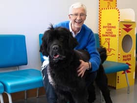 Paul O'Grady at Battersea Cats and Dogs Home with Peggy, a Newfoundland