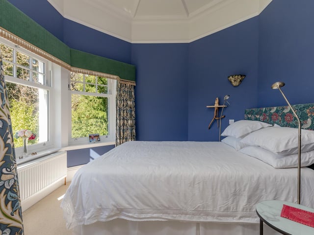 The principal bedroom includes a large dressing room and private balcony.