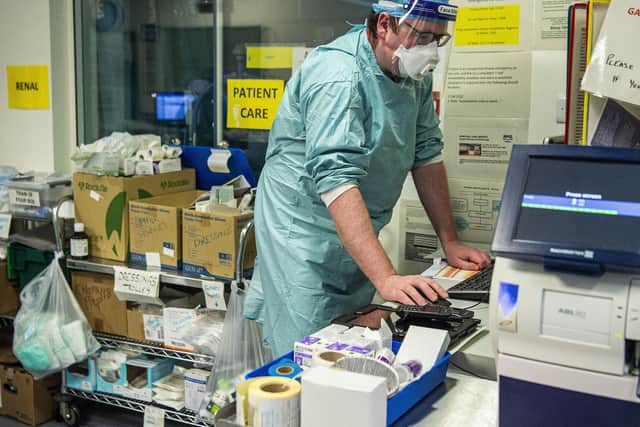 Staff must wear full PPE while in the ICU. Picture: Lisa Ferguson