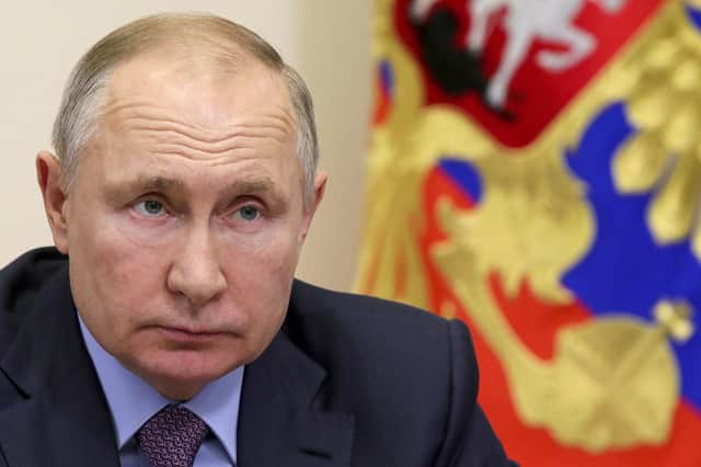 Vladimir Putin's regime has been blamed for spreading disinformation designed to disrupt democracy in other countries, such as the UK and US (Picture: Mikhail Klimentyev/Sputnik/Kremlin pool photograph via AP)