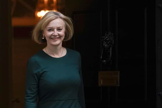Prime Minister Liz Truss steps out 10 Downing Street. Picture: AP Photo/Alberto Pezzali