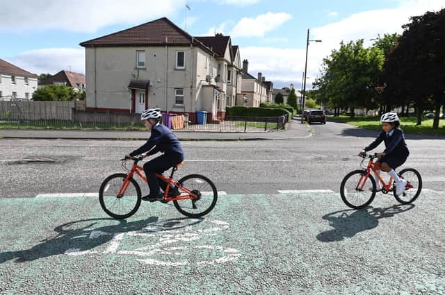 The pilot schemes will assess how children's lives can be improved by being given bikes to get around. Picture: John Devlin