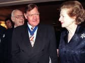Sir Bernard Ingham talks to Baroness Thatcher at the 1998 Television and Radio Industry Club Awards in London (Picture: PA)
