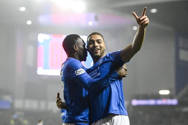 Rangers striker Cyriel Dessers celebrates with Rabbi Matondo (left) after opening the scoring in the win over Ross County. (Photo by Rob Casey / SNS Group)