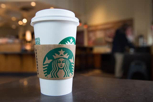 Reusable cups are in vogue for reducing waste but are no longer welcome at Starbucks cafes over fears of the coronavirus, the coffee chain announced.  SAUL LOEB/AFP via Getty Images