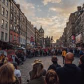 Crowds normally pack into the Royal Mile to watch street performers when the Fringe is on. Picture: David Monteith Hodge
