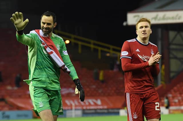Aberdeen's Joe Lewis and David Bates after the 2-0 win over Livingston.