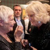 Her Majesty The Queen shares a laugh with Dame Judi Dench. (All photos: Sim Canetty-Clarke)