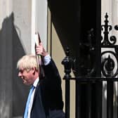 Prime Minister Boris Johnson reacts as he leaves from 10 Downing Street in central London. Picture: Justin Tallis/AFP via Getty Images