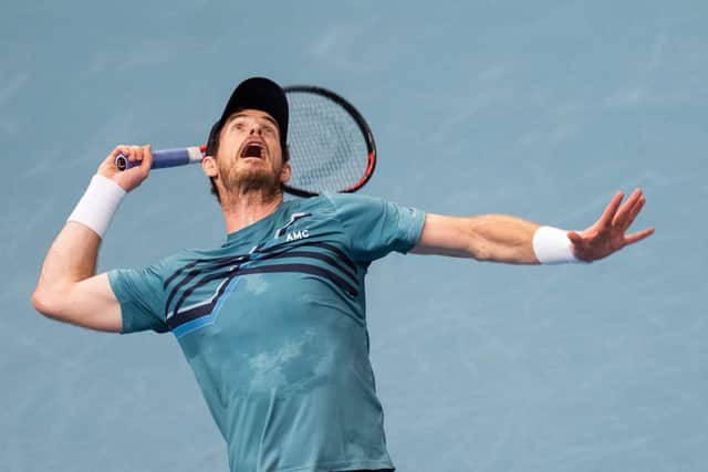 Britain's Andy Murray serves the ball to Poland's Hubert Hurkacz (not in picture) during the men's singles match at the Erste Bank Open Tennis tournament in Vienna on October 25, 2021. (Photo by GEORG HOCHMUTH/APA/AFP via Getty Images)