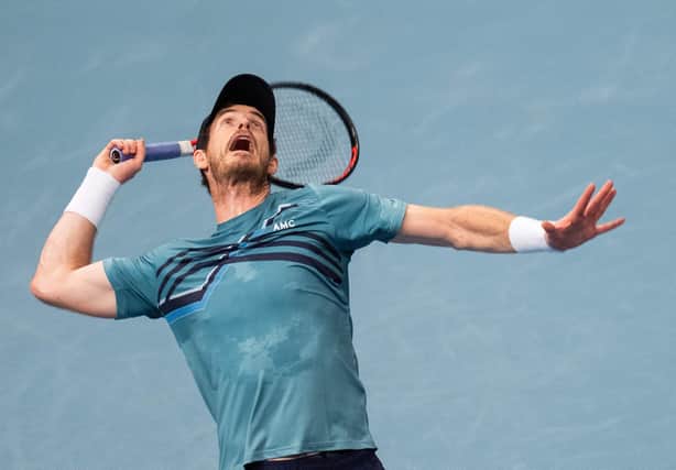 Britain's Andy Murray serves the ball to Poland's Hubert Hurkacz (not in picture) during the men's singles match at the Erste Bank Open Tennis tournament in Vienna on October 25, 2021. (Photo by GEORG HOCHMUTH/APA/AFP via Getty Images)